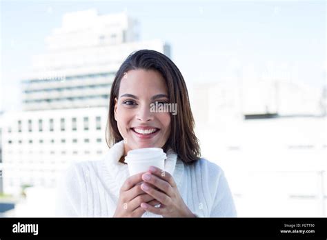 Beautiful Brunette Drinking A Coffee Stock Photo Alamy
