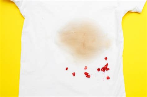 Premium Photo | Dirty stains on a white tshirt from berries and drink ...