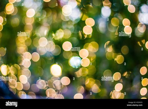 Christmas Background Of De Focused Lights With Decorated Tree Stock