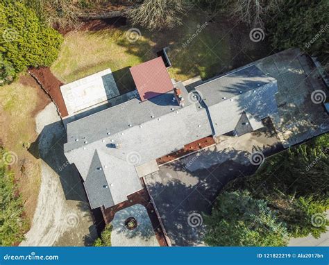 Aerial View Of Large Grey Home Surrounded By Trees Stock Image Image