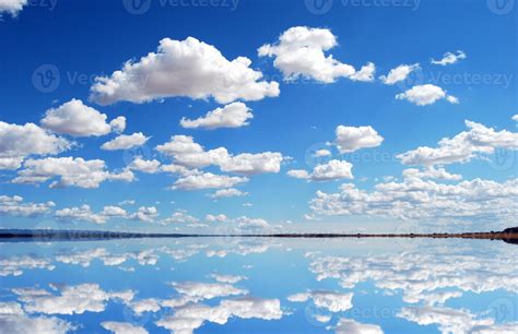 Amazing Clear Blue Sky And Clouds With Mirror Reflections Of Sky And