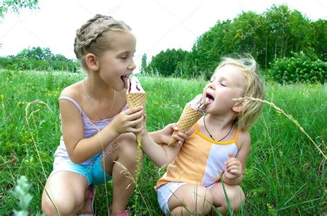 Baby eating ice cream — Stock Photo © lexmomot #11508363