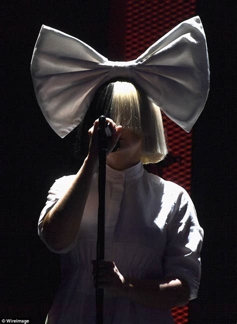 Sia Performs In Iconic Wig Onstage At The 2016 Iheartradio Music