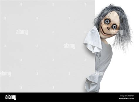 Scary Momo standing behind the wall on white background. Scary face for ...