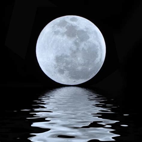 Full Blue Moon Over Water With Reflections Stock Photo By Danielkrol