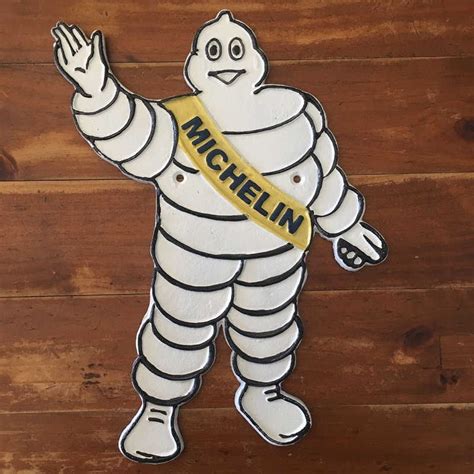 Michelin Man Waving Sign Cast Iron Plaque Kidscollections