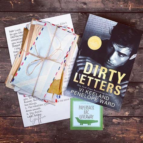 Some Books And Envelopes On A Wooden Table