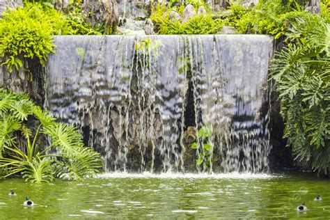 High Definition Photography Of Artificial Waterfalls Around The Park