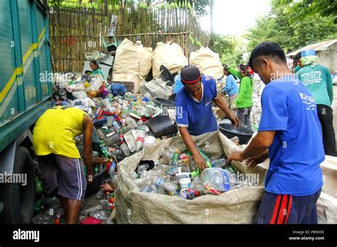 ANGONO RIZAL PHILIPPINES JULY 4 2018 Workers Of A Materials