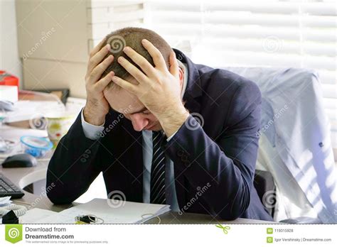 Men stressed out at work stock photo. Image of office - 119315928