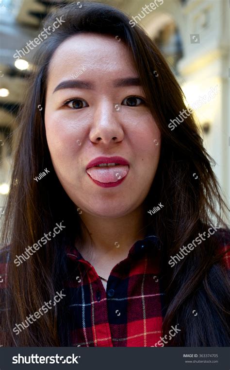 Portrait Girl Making Funny Face Showing Stock Photo 363374705