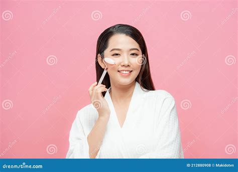 Beauty Face Care Woman Doing Face Massage With Rose Quartz Face Roller