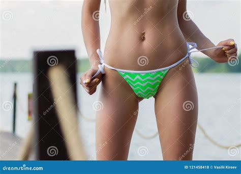 She Untied Her Bikini Bottoms