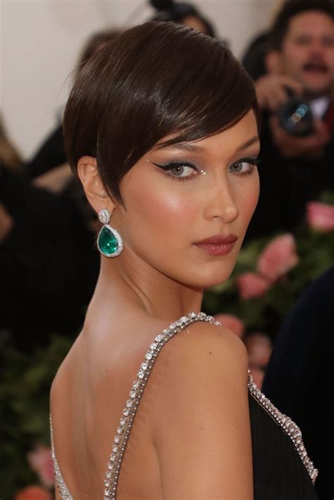 Bella Hadid Just Cut Her Hair Into A Pixie And Looks Almost Unrecognizable Photos Allure