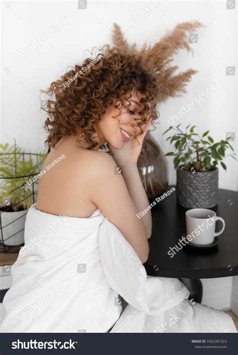 Attractive Tender Curly Haired Naked Girl Stock Photo