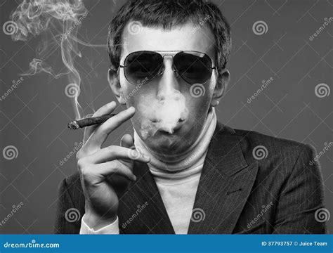 Man Wearing Sunglasses And Smoking A Cigerette Stock Image Image Of