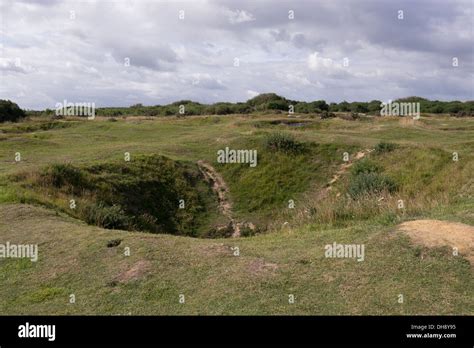 Shell Craters From Allied Artillery Barrage At Pointe Du Hoc During