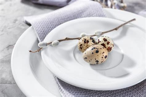 Premium Photo Quail Eggs And Pussy Willow Twig On Plate As Decor For Easter Table Setting