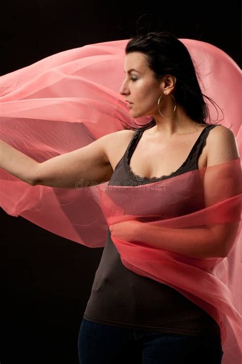 40 Something Brunette Woman In The Studio With A White Background Stock