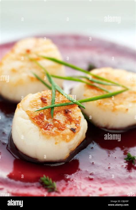 Perfectly Seared Scallop Starter With Bright Cranberry And Balsamic