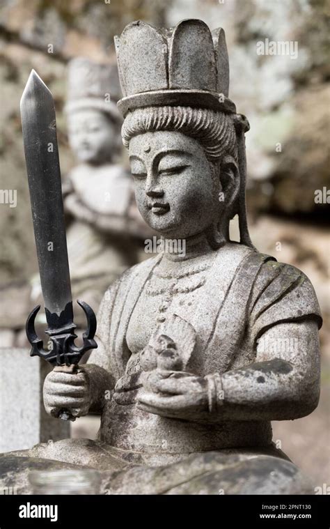 A Statue Holding A Sword At Senkoji A Buddhist Temple In Onomichi Hiroshima Prefecture Japan