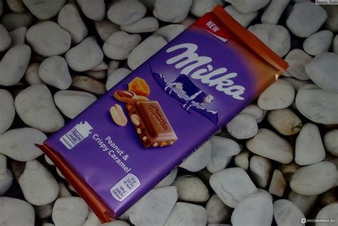 Молочный шоколад Milka Peanut Crispy Caramel Милка с большими