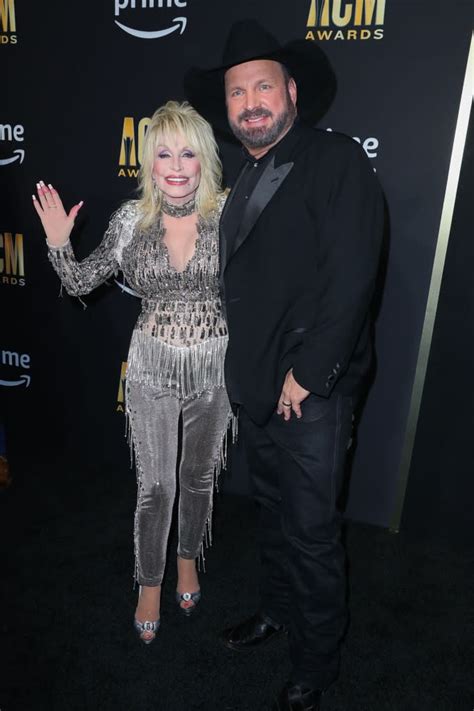 The GOAT! Dolly Parton Makes Garth Brooks Blush With ACMs Threesome Joke