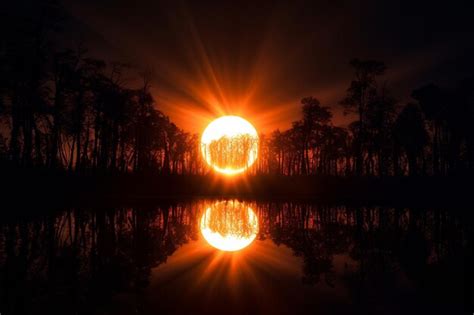 Premium Photo A Solar Eclipse As The Moon Passes In Front Of The Sun