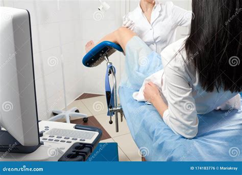 Cropped Panorama Of Gynecologist Examining A Patient Who Is Sitting In