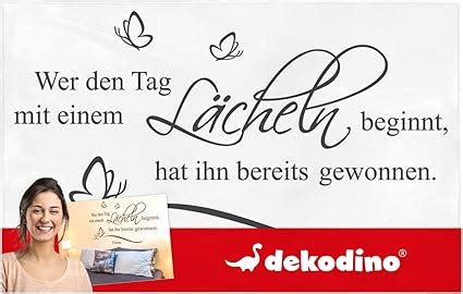 dekodino Wandtattoo Spruch Zitat Wer den Tag mit einem Lächeln beginnt