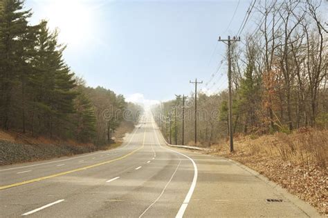 Winding Road Going Through The Country Side Of Boston Stock Photo