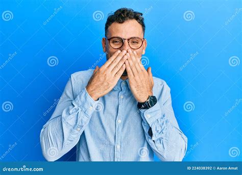 Young Hispanic Man Wearing Casual Clothes And Glasses Laughing And