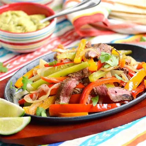 Grilled Steak Fajitas Cooking With Curls