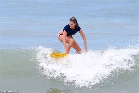 Margot Robbie Shows Off Her Strong Bikini Body As She Goes Surfing