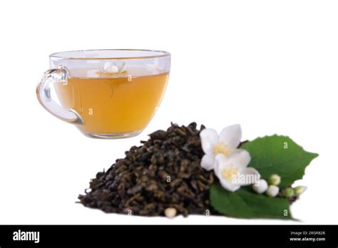 Dried Tea Leaves Fresh Jasmine Blossoms With Green Leaf And Glass Tea