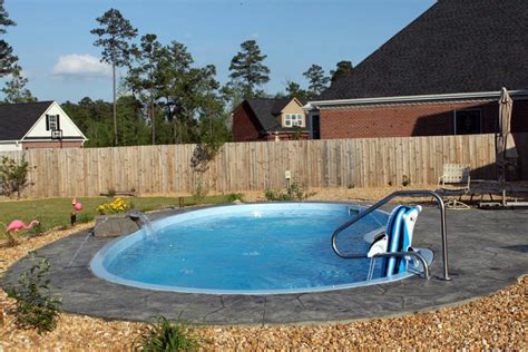 Inground Fiberglass Pool Stamped Concrete Rock Waterfall Small