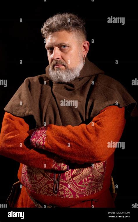 Mature Bearded Man In Traditional Historic Clothes Studio Portrait