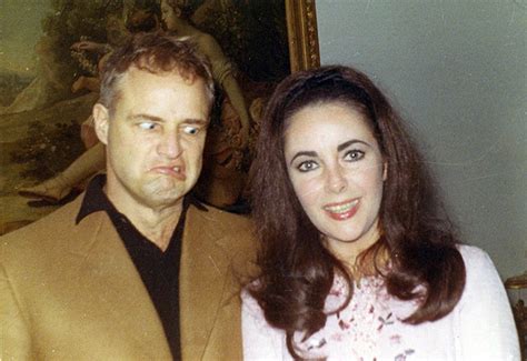 Marlon Brando photobombs Elizabeth Taylor, 1967 ~ vintage everyday