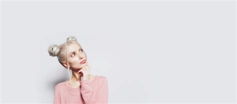 Premium Photo Studio Portrait Of Pretty Blonde Girl Looking Up