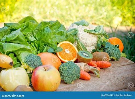 Organic Fruits And Vegetables On Table Stock Photo - Image: 62674516