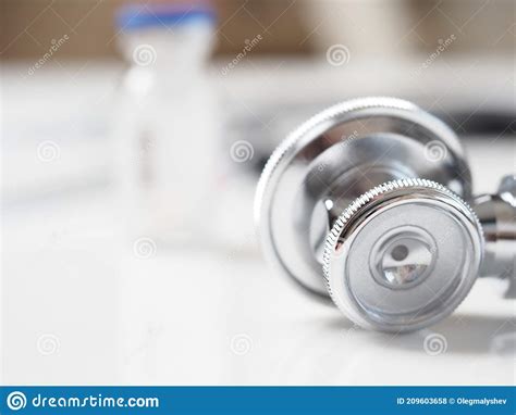 Close Up Bottle Vaccine And Syringe Medicine Stethoscope Stock Photo