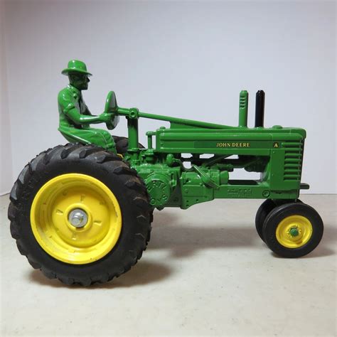 John Deere Model "A" Tractor with Cast In Driver, 1/16 scale, JD-557DA-E