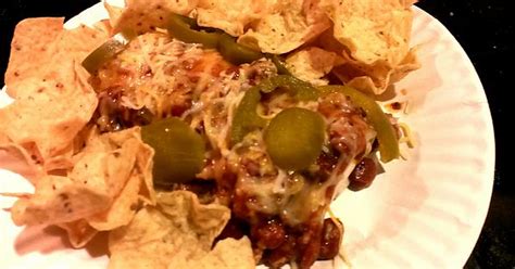 Steak 3 Chz Burrito Topped With Spicy Chili And 4 Chz Mexican Blend And Jalapenos Chips To