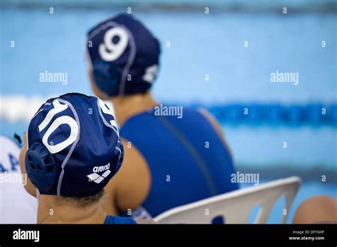Women Waterpolo Team Members By Olympic Size Swimming Pool Stock Photo