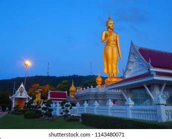 Phra Mongkol Maharaj Golden Standing Buddha Stock Photo