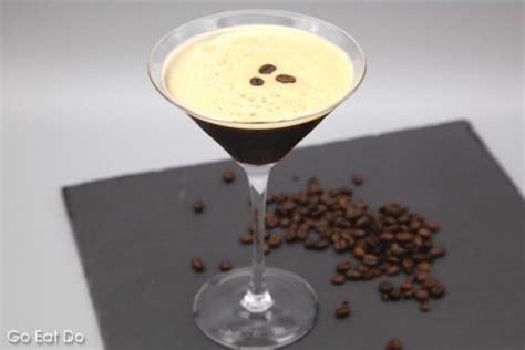 Espresso Martini Served In A Martini Glass And Garnished With Roast