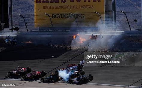 Indycar Driver Dan Wheldon Dies In Fatal Crash Sequence Photos and Premium High Res Pictures ...