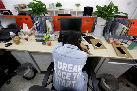 Chinese tech workers disclose working hours in criticism of '996' | Reuters