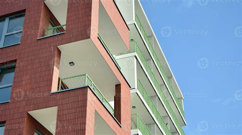 Condominium and apartment building with symmetrical modern architecture ...