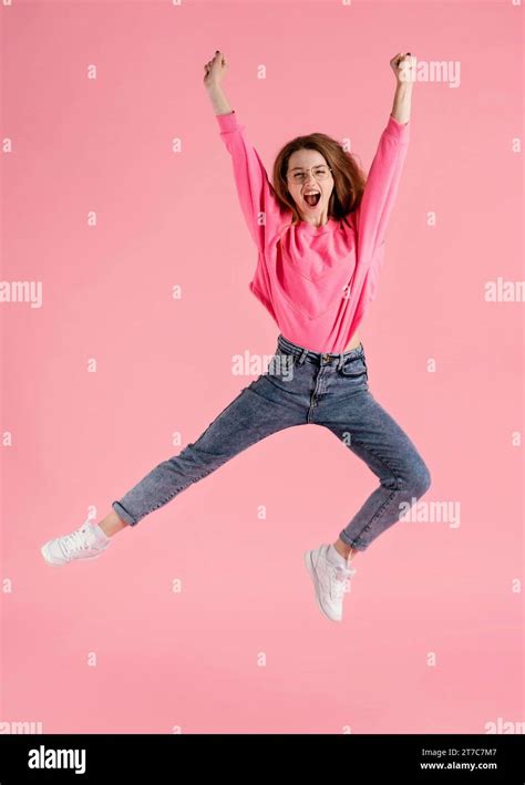 Portrait Happy Woman Jumping Stock Photo Alamy